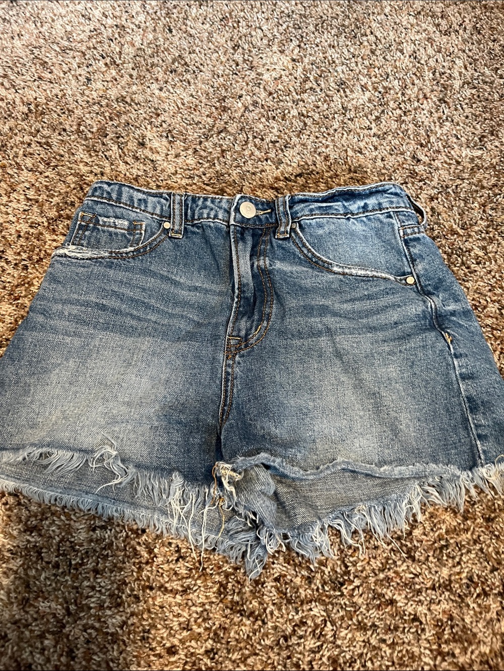 High-Rise Washed Blue Denim Cutoff Shorts with Frayed Hem